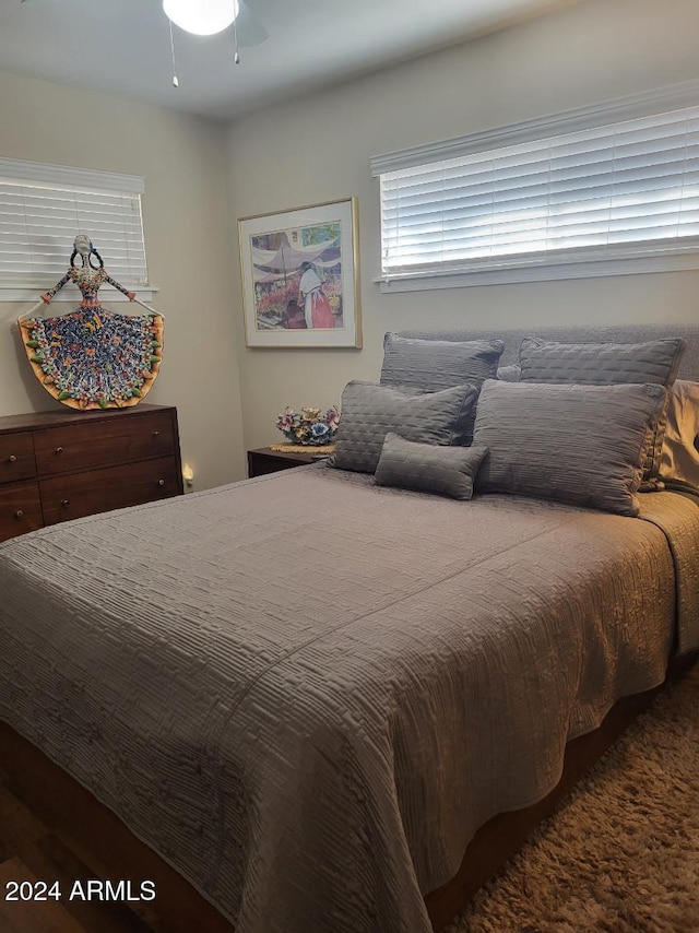 bedroom featuring ceiling fan