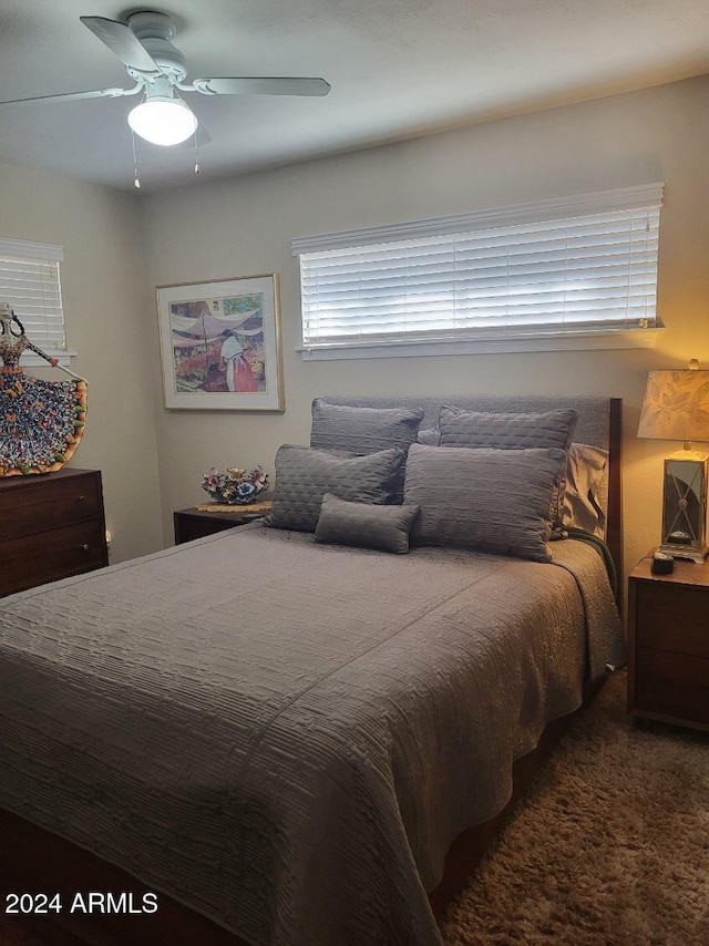 bedroom with carpet flooring and ceiling fan