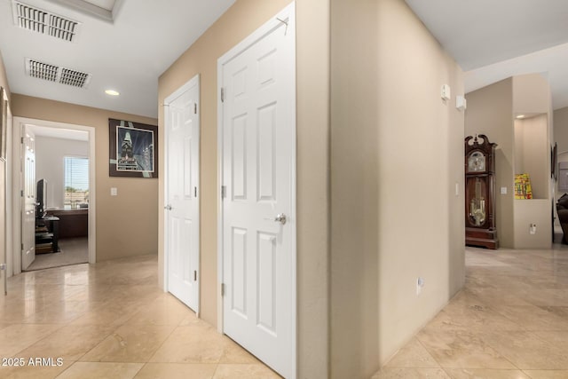 hallway featuring visible vents