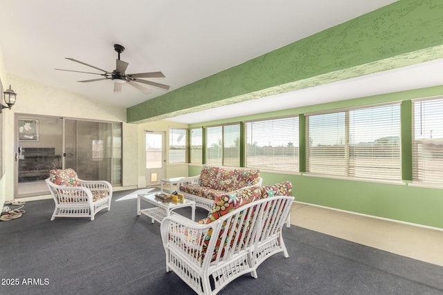 sunroom / solarium with vaulted ceiling and a ceiling fan