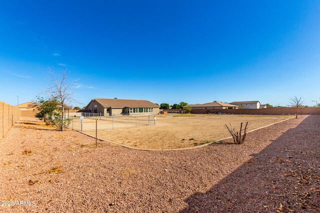 view of yard with fence