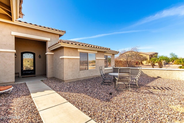 view of yard with outdoor dining area and a patio
