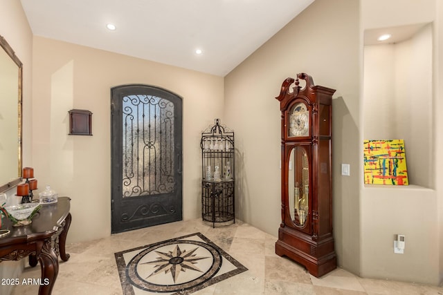 foyer entrance featuring recessed lighting