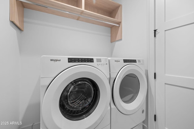 laundry area with washing machine and dryer