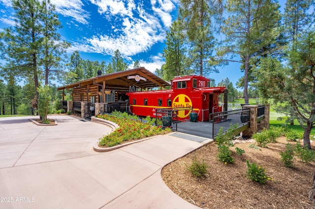 view of home's community featuring a playground
