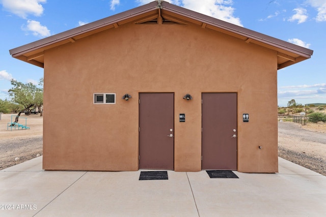 exterior space featuring stucco siding