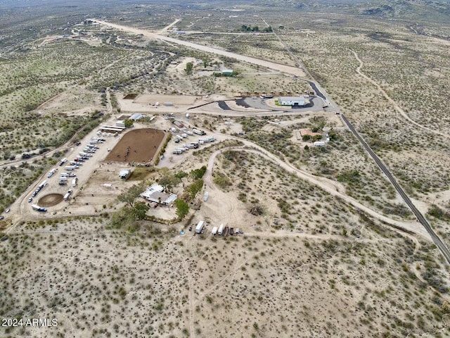 aerial view featuring view of desert and a rural view