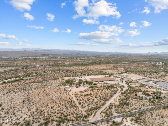 drone / aerial view featuring a mountain view