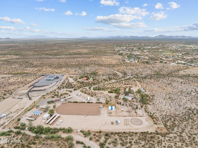 aerial view with a rural view, a mountain view, and view of desert