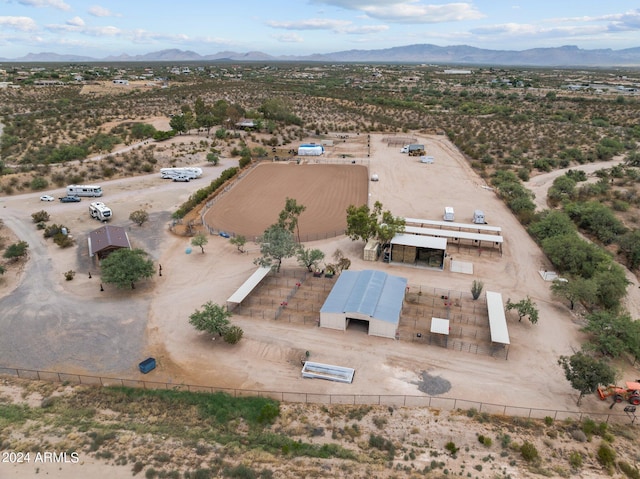 bird's eye view with view of desert and a mountain view