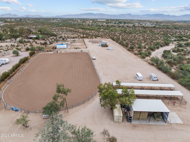 drone / aerial view with a desert view and a mountain view