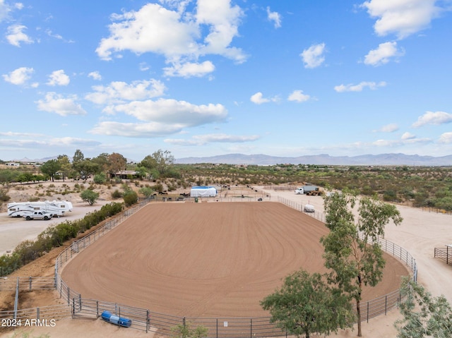 drone / aerial view featuring a rural view and a mountain view