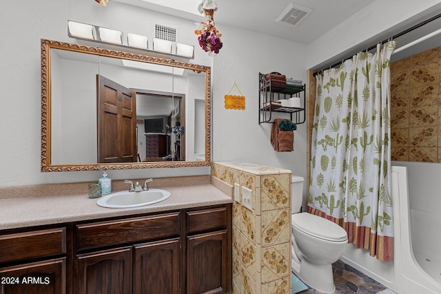 full bath with toilet, vanity, shower / bath combo with shower curtain, and visible vents