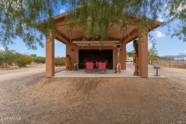 surrounding community featuring a patio