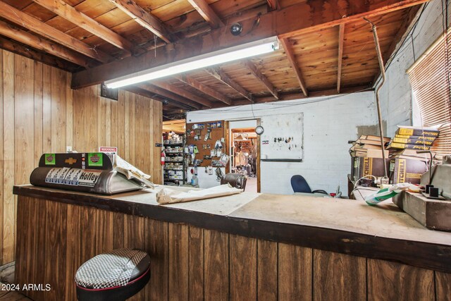 bar with wood ceiling and wood walls