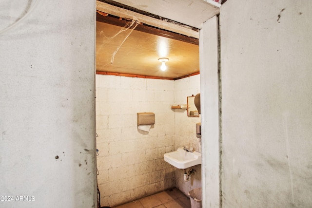 bathroom with sink and tile patterned floors