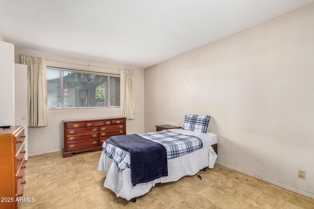 500 W Clarendon Ave Unit B11, Phoenix, AZ 85014 - bedroom with baseboards
