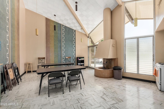 500 W Clarendon Ave Unit B11, Phoenix, AZ 85014 - dining area with high vaulted ceiling and beam ceiling
