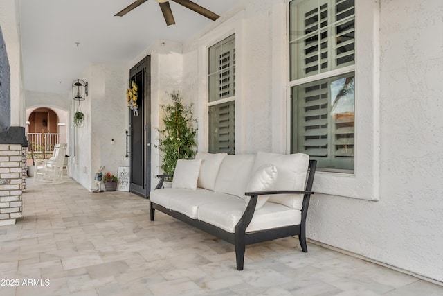 view of patio featuring ceiling fan and outdoor lounge area