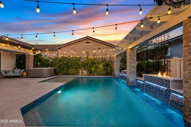 pool at dusk featuring a patio area, fence, an outdoor hangout area, and a fenced in pool