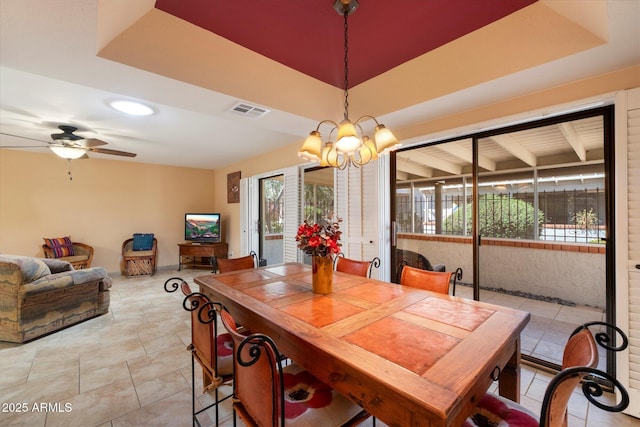 dining space featuring a healthy amount of sunlight, light tile patterned floors, and visible vents