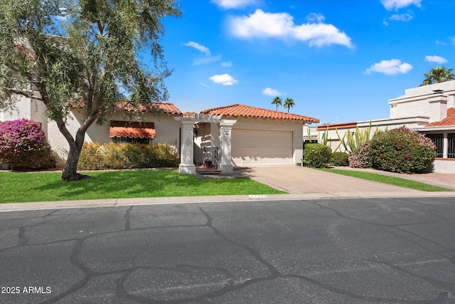 mediterranean / spanish-style house featuring an attached garage, a tiled roof, driveway, and stucco siding