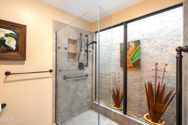 bathroom with a stall shower