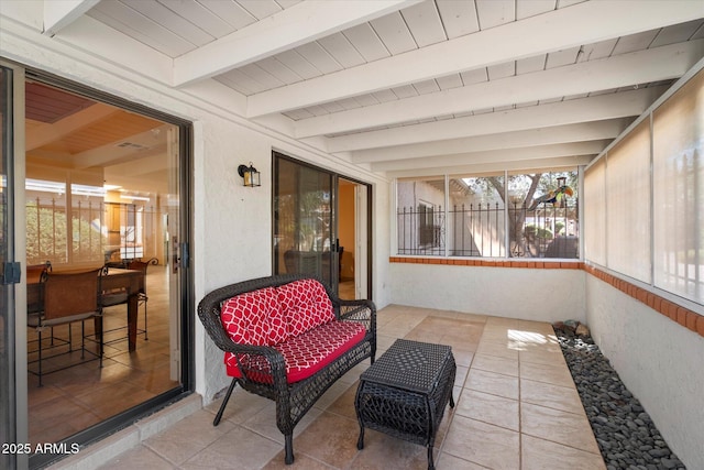 sunroom / solarium with beam ceiling
