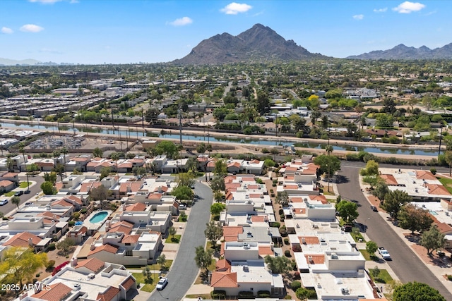 bird's eye view with a water and mountain view and a residential view