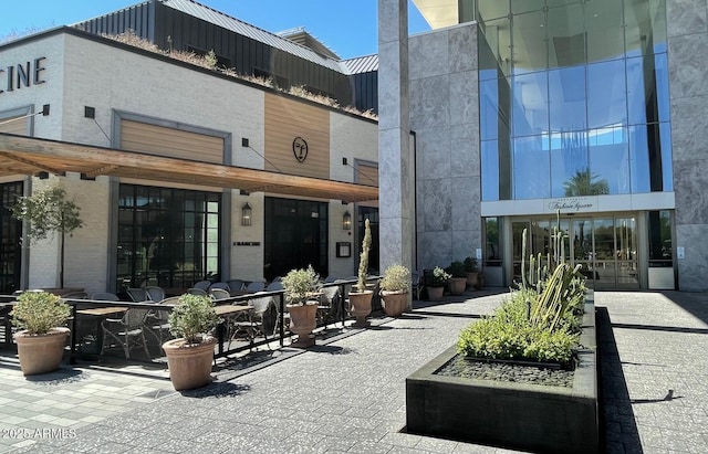 rear view of property with a patio area