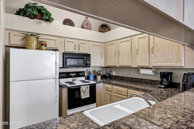 16357 E Arrow Dr Unit 115, Fountain Hills, AZ 85268 - kitchen featuring freestanding refrigerator, black microwave, electric stove, light brown cabinets, and dark countertops