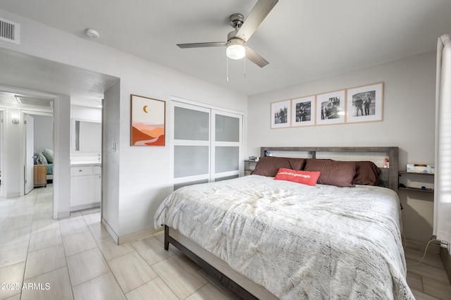 bedroom featuring visible vents, baseboards, and ceiling fan