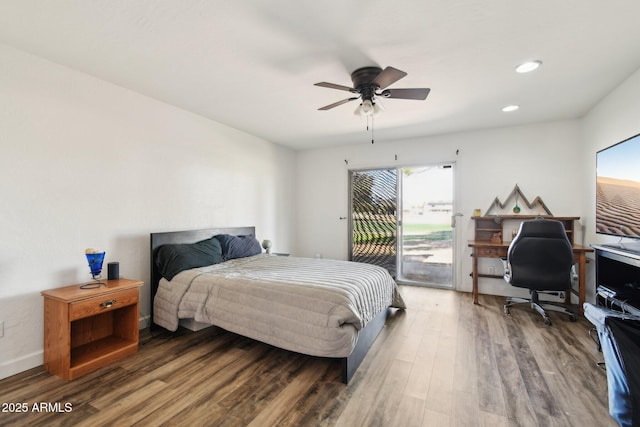 bedroom featuring baseboards, ceiling fan, wood finished floors, access to exterior, and recessed lighting