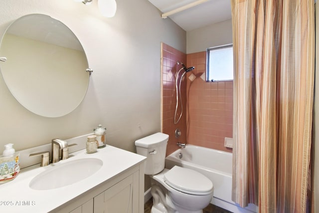 bathroom featuring vanity, toilet, and shower / tub combo with curtain