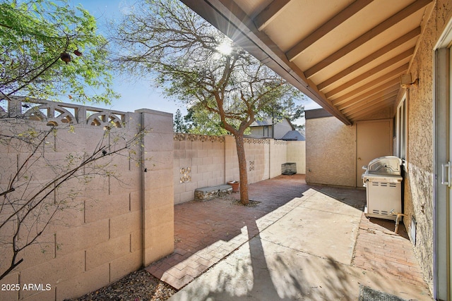 view of patio with a fenced backyard