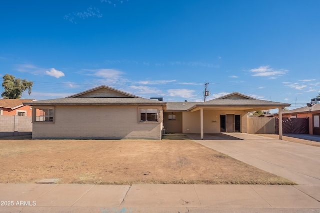 ranch-style house with a carport