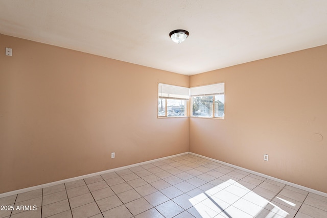 view of tiled spare room