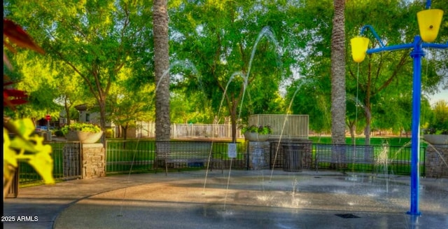 surrounding community featuring fence