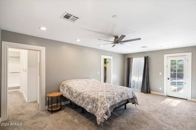 bedroom featuring baseboards, visible vents, recessed lighting, light carpet, and access to outside