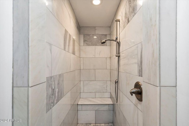 interior space with a tile shower