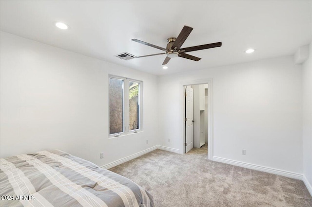 bedroom with recessed lighting, baseboards, visible vents, and light carpet