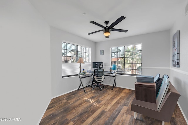 home office featuring a ceiling fan, baseboards, and wood finished floors