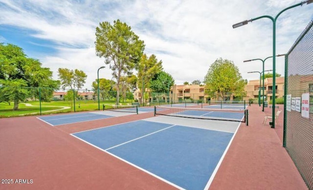 view of sport court featuring community basketball court and fence