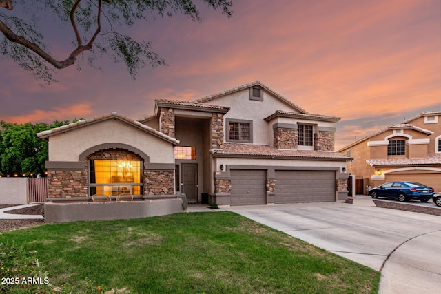 7029 E Monte Cir, Mesa, AZ 85209 - mediterranean / spanish-style house with stucco siding, stone siding, and an attached garage