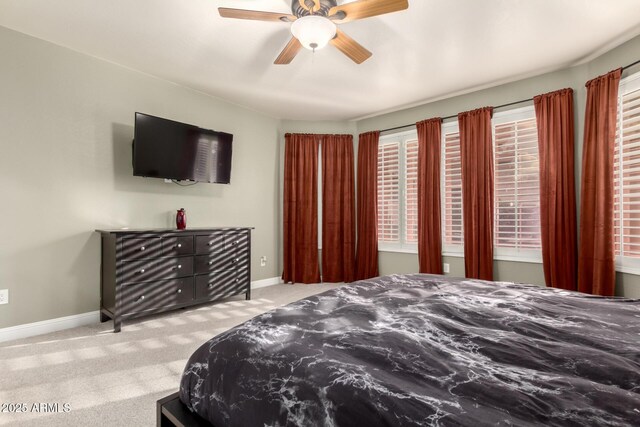 7029 E Monte Cir, Mesa, AZ 85209 - bedroom with carpet, baseboards, a ceiling fan, and multiple windows