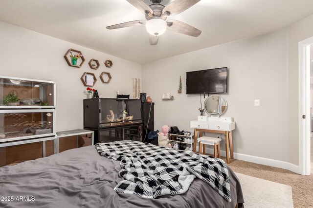 7029 E Monte Cir, Mesa, AZ 85209 - carpeted bedroom featuring baseboards and a ceiling fan