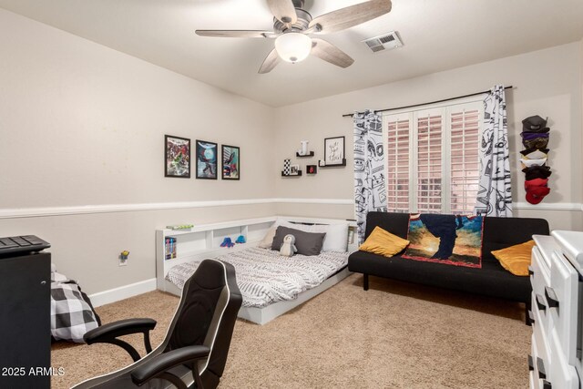 7029 E Monte Cir, Mesa, AZ 85209 - carpeted bedroom with a ceiling fan and baseboards
