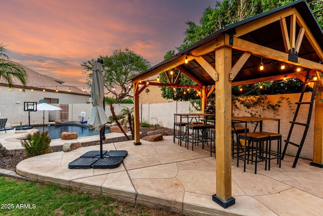 7029 E Monte Cir, Mesa, AZ 85209 - fenced backyard featuring a gazebo and a patio