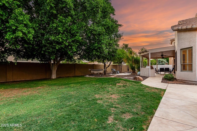 7029 E Monte Cir, Mesa, AZ 85209 - view of yard featuring ceiling fan, a patio, and an outdoor living space