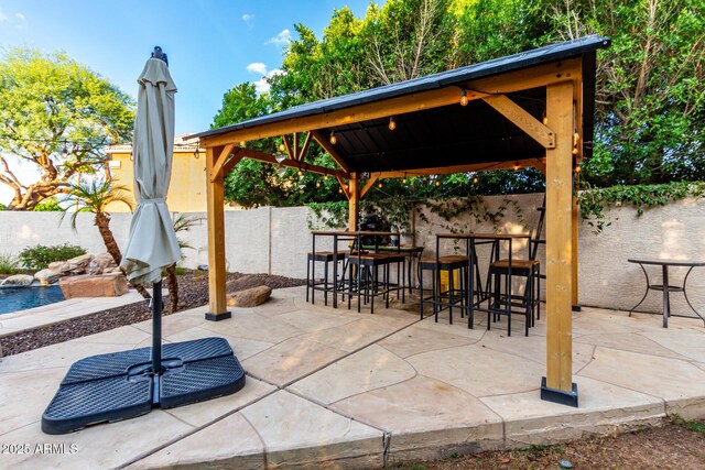 7029 E Monte Cir, Mesa, AZ 85209 - fenced backyard with a gazebo and a patio